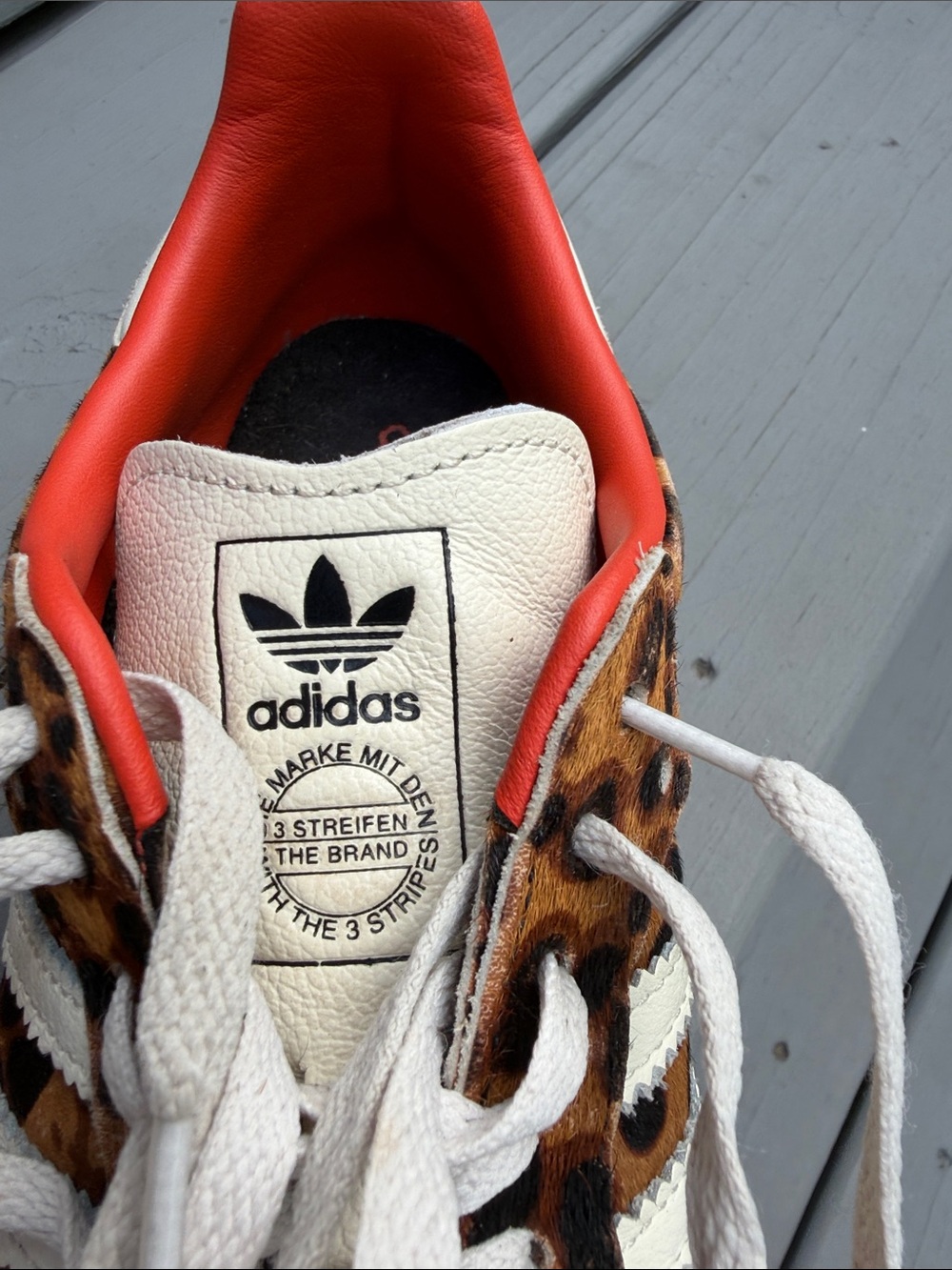 adidas women’s Leopard Print Sneakers with White Stripes and orange trim. - Picture 10 of 10